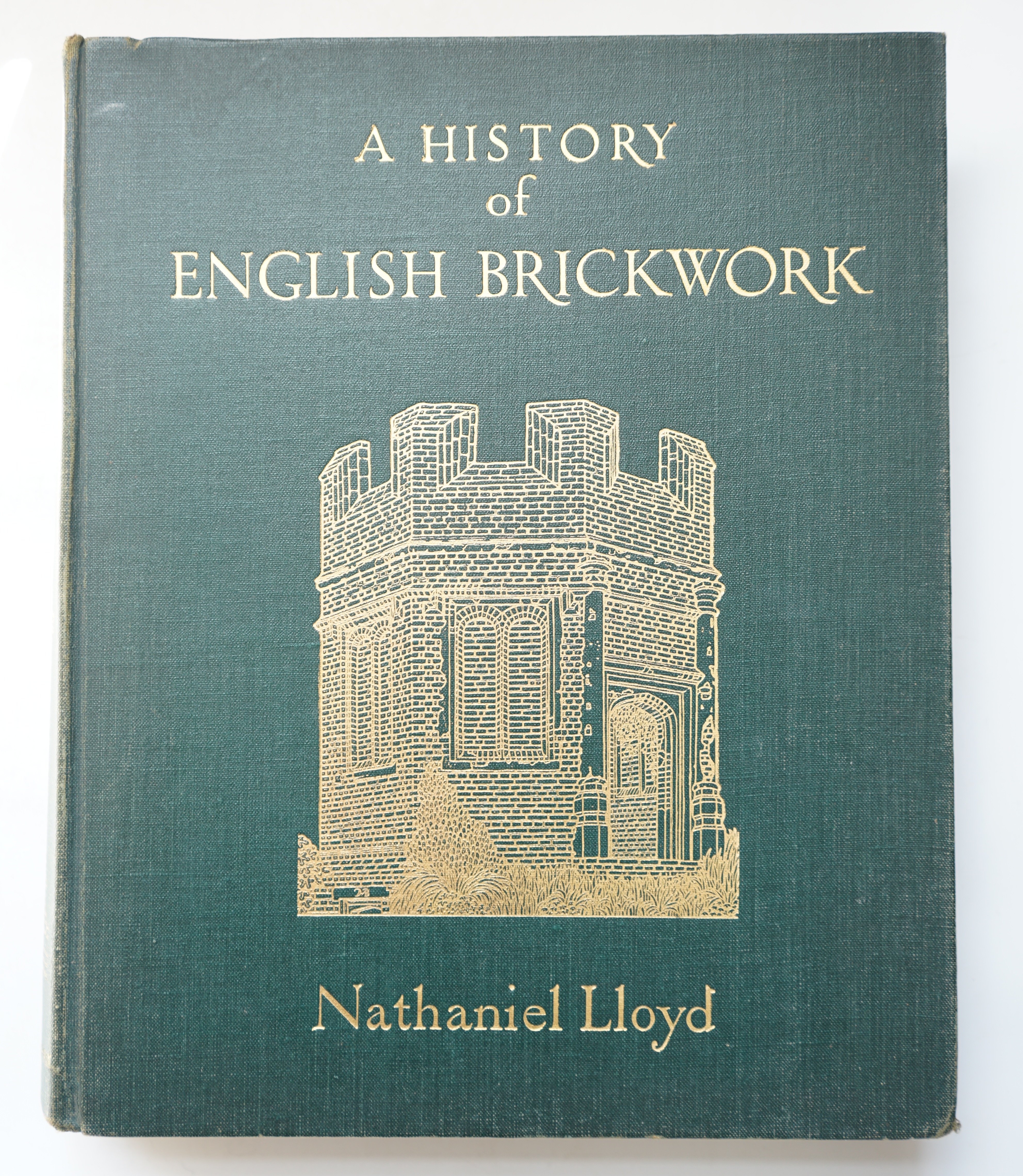 Lloyd, Nathaniel - A History of English Brickwork With Examples and Notes of the Architectural Use and Manipulation of Brick from Medieval Times to the end of the Georgian Period, large 4to, green pictorial gilt cloth, L